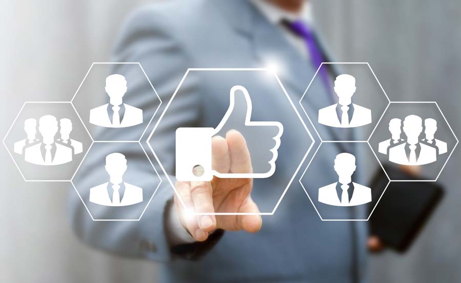 Businessman using virtual innovative touchscreen pressing thumb